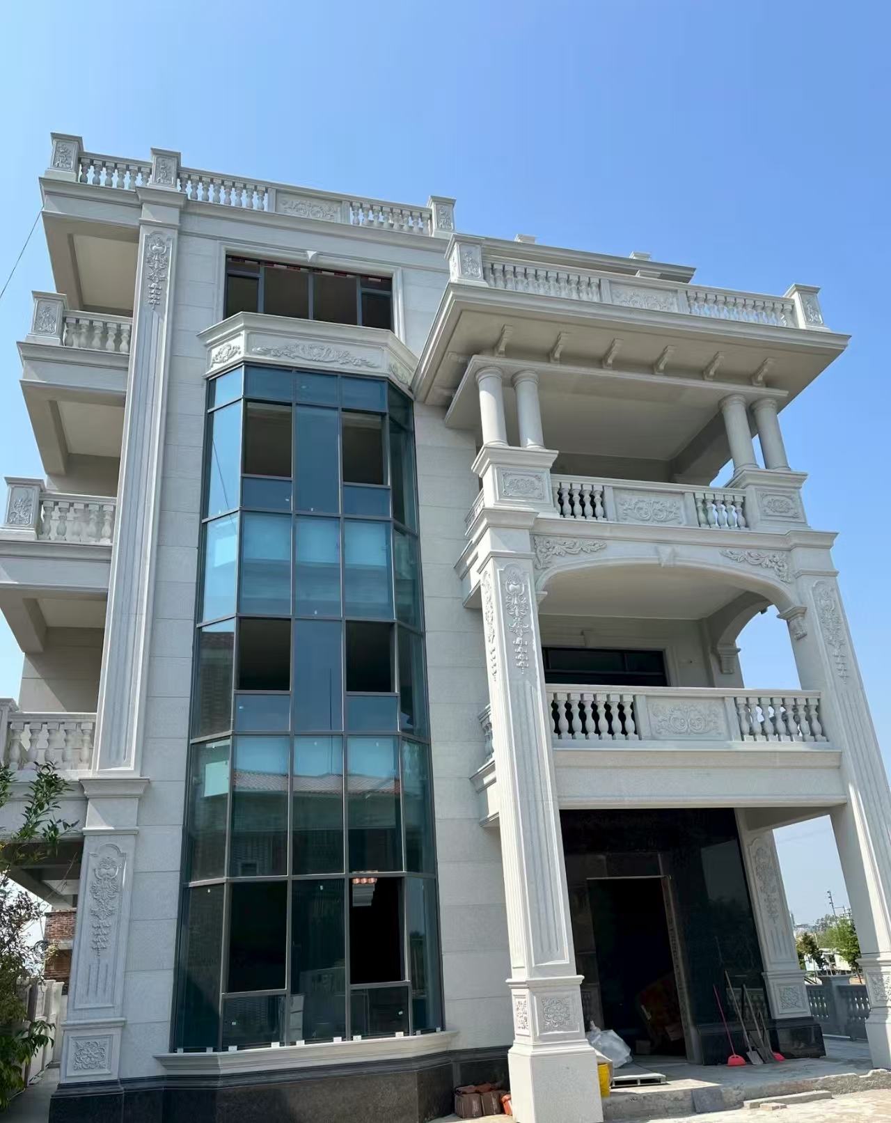 济宁 白麻花岗岩别墅外墙干挂效果展示